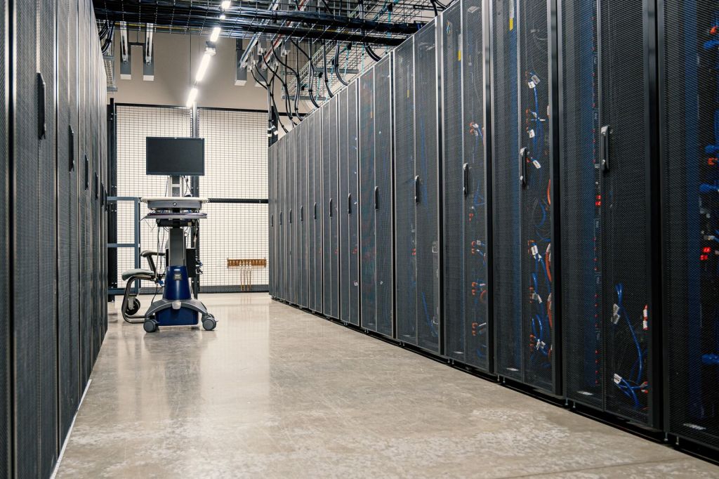 Corridor of server racks in a data centre